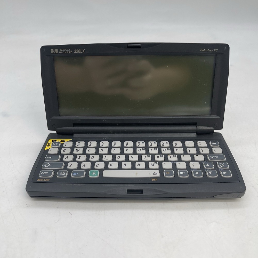 Hewlett Packard HP 320LX Handheld Palmtop PC Computer NO STYLUS Untested